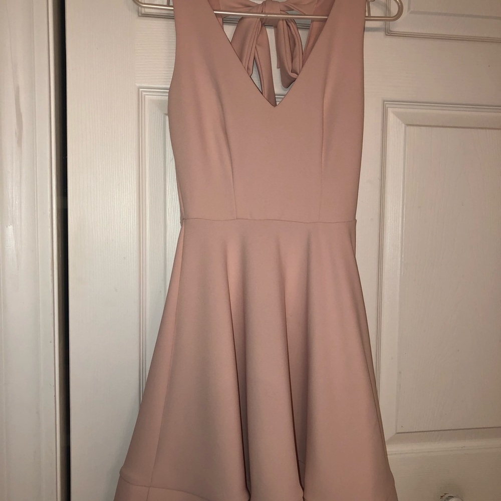 B. Darlin Sleeveless V-Neck Bow-Back Fit-and-Flare Dress
Color:	Dark Blush